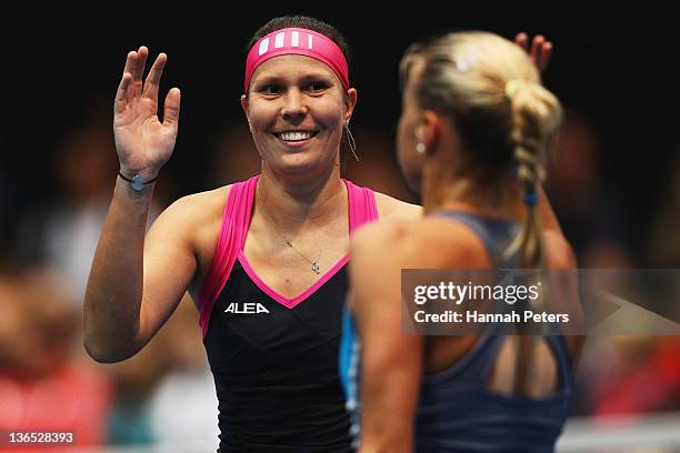 Lucie Hradecka and Andrea Hlavackova of the Czech Republic celebrate beating Flavia Pennetta of Italy and Julia Goerges of Germany in the Women's...