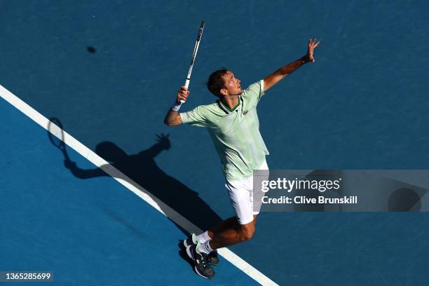 Daniil Medvedev of Russia serves in his first round singles match against Henri Laaksonen of Switzerland during day two of the 2022 Australian Open...