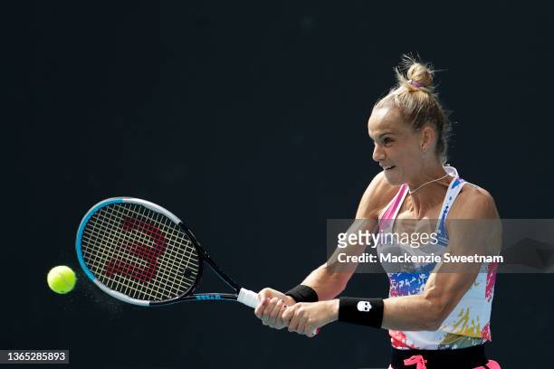 Arantxa Rus of the Netherlands plays a backhand in her first round singles match against Tamara Zidansek of Slovakia during day two of the 2022...
