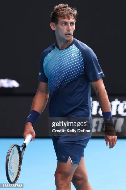 Henri Laaksonen of Switzerland looks on in his first round singles match against Daniil Medvedev of Russia during day two of the 2022 Australian Open...
