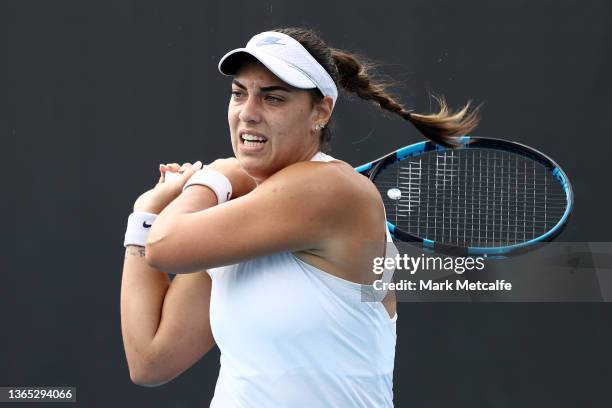 Ana Konjuh of Croatia plays a backhand in her first round singles match against Shelby Rogers of United States during day two of the 2022 Australian...