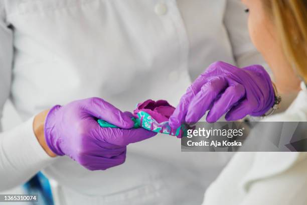 dentist taking patients dental impression. - silikone stock pictures, royalty-free photos & images