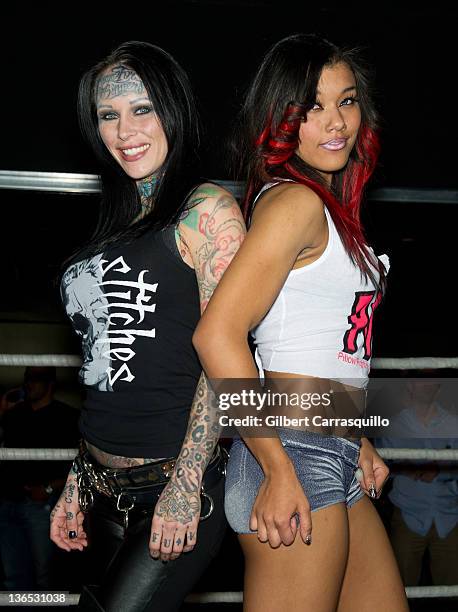 Michelle 'Bombshell' McGee and Rita Rampage attend the 2012 Lingerie Female Pillow Fighting Championships at The Deck on January 6, 2012 in...