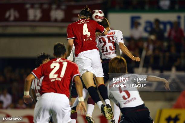 Marcus Tulio Tanaka of Urawa Red Diamonds heads to score his side's first goal during the J.League J1 match between Urawa Red Diamonds and Vissel...