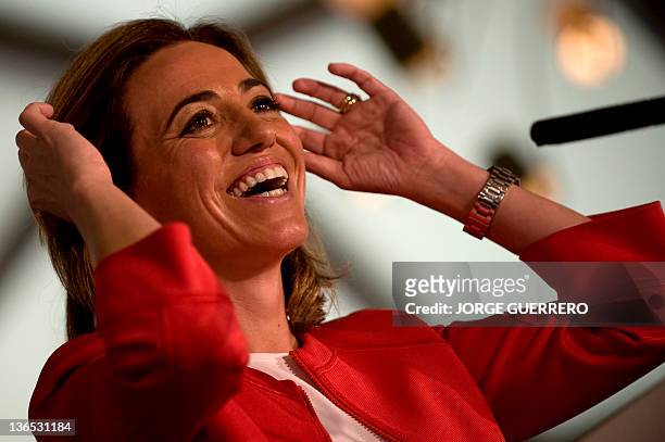 Spain's former defence minister Carmen Chacon gives a speech during a meeting in which she announced her official candidacy for the leadership of...