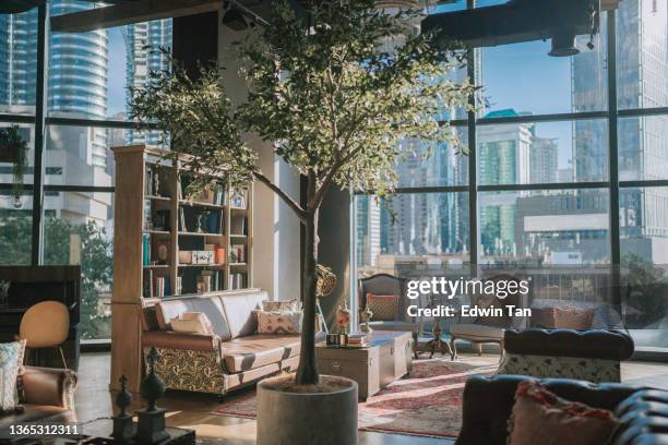 luxury lounge lobby reception with leather sofa book shelf living room - loungeroom stockfoto's en -beelden