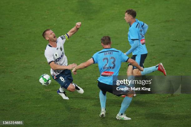 Oliver Bozanic of the Mariners is challenged by Rhyan Grant of Sydney FC during the FFA Cup Semi Final match between Sydney FC and Central Coast...