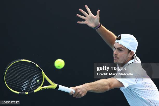 Maximilian Marterer of Germany plays a backhand in his first round singles match against Taylor Fritz of United States during day two of the 2022...