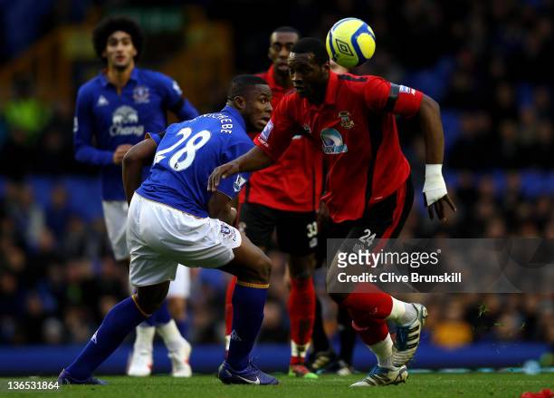 Victor Anichebe of Everton competes with Patrick Kanyuka of Tamworth during the FA Cup Third Round match between Everton and Tamworth at Goodison...