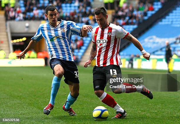 Conor Thomas of Coventry City and Daniel Fox of Southampton battle for the ball during the FA Cup 3rd round match between Coventry City and...