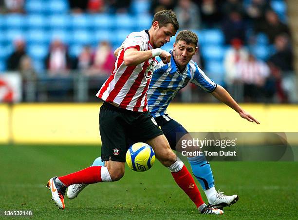 Gary Deegan of Coventry City and Morgan Schneiderlin of Southampton in action during the FA Cup 3rd round match between Coventry City and Southampton...
