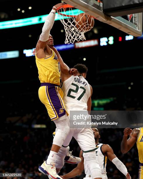 Russell Westbrook of the Los Angeles Lakers dunks the ball against Rudy Gobert of the Utah Jazz during the second quarter at Crypto.com Arena on...