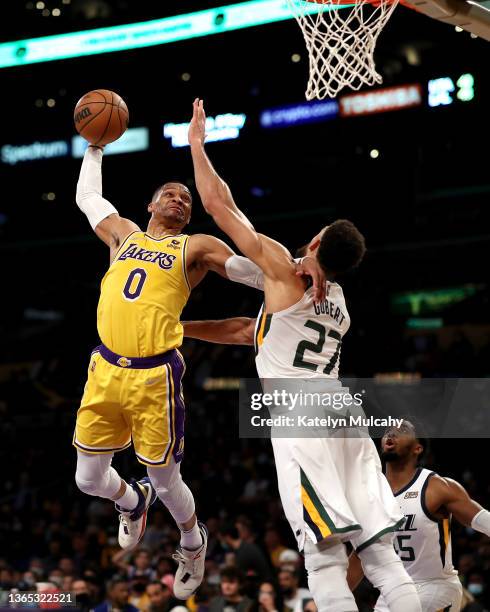 Russell Westbrook of the Los Angeles Lakers dunks the ball against Rudy Gobert of the Utah Jazz during the second quarter at Crypto.com Arena on...