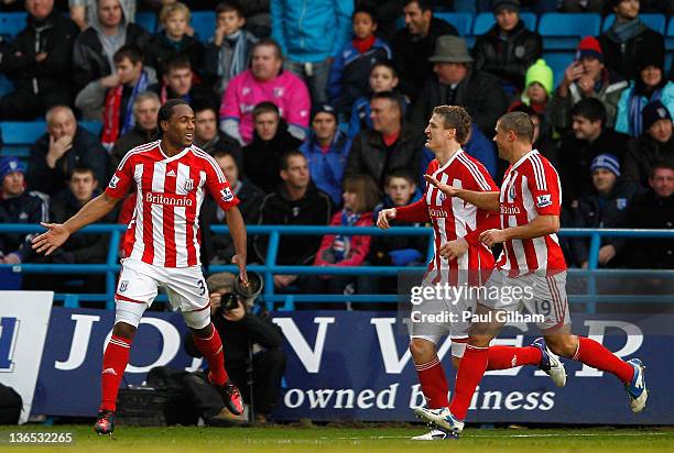 Cameron Jerome of Stoke City celebrates his goal with teammates Robert Huth and Jonathan Walters during the FA Cup Third Round match between...
