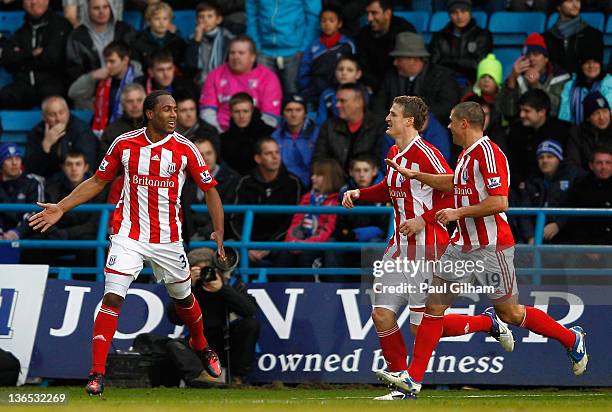 Cameron Jerome of Stoke City celebrates his goal with teammates Robert Huth and Jonathan Walters during the FA Cup Third Round match between...