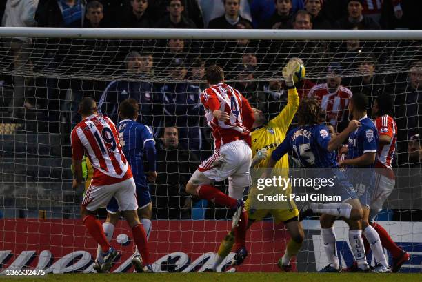 Robert Huth of Stoke City scores his teams third goal during the FA Cup Third Round match between Gillingham and Stoke City at Priestfield Stadium on...