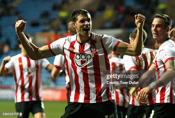 Aaron Martin of Southampton celebrates with team-mates after scoring his side's second goal during the FA Cup 3rd round match between Coventry City...