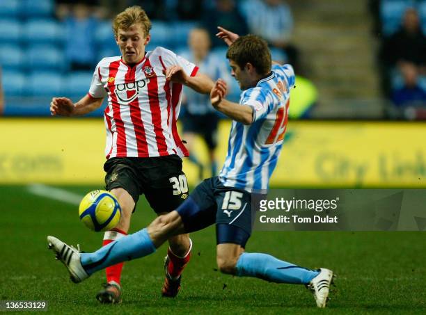 Martin Craine of Coventry City and James Ward-Prowse of Southampton battle for the ball during the FA Cup 3rd round match between Coventry City and...