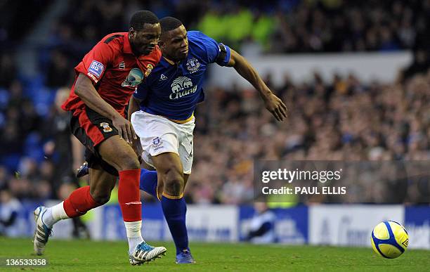Everton's Nigerian striker Victor Anchebe vies with Tamworth's Congolese defender Patrick Kanyuka during the English FA Cup 3rd Round football match...