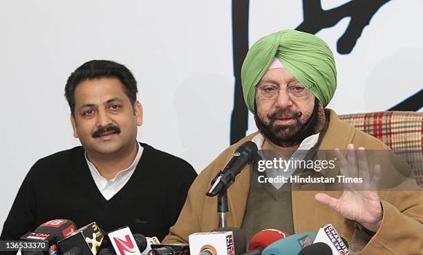 Congress Party State President Capt. Amarinder Singh and congress leader Vijay Inder hold a news conference on January 7, 2012 in Chandigarh, India....