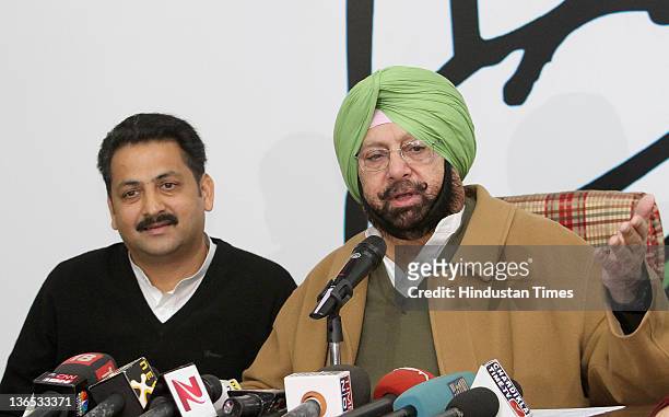 Congress Party State President Capt. Amarinder Singh and congress leader Vijay Inder hold a news conference on January 7, 2012 in Chandigarh, India....