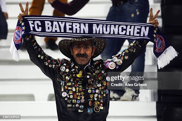 Fan poses prior to during the international friendly match between Al-Ahly Cairo and Bayern Muenchen at Al-Rayyan Stadium on January 7, 2012 in Doha,...