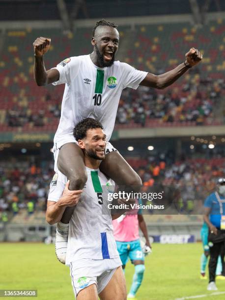 And KEI KAMARA of Sierra Leone celebrate after the Group E Africa Cup of Nations 2021 match between Ivory Coast and Sierra Leone at Stade de Japoma...