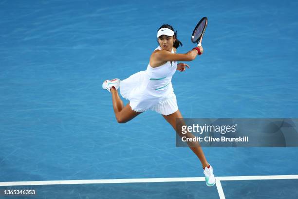Emma Raducanu of Great Britain plays a forehand in her first round singles match against Sloane Stephens of United States during day two of the 2022...