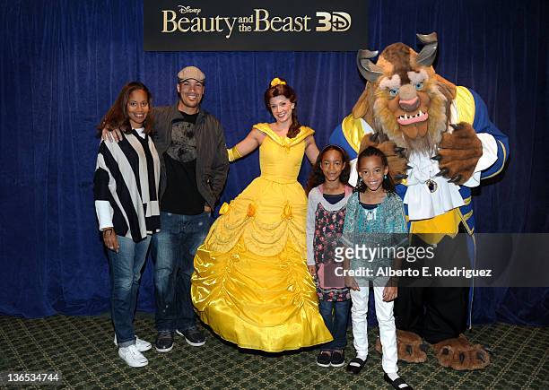 Actor Coby Bell , Aviss Pinkney-Bell and daughters Serrae Bell and Jaena Bell pose with Belle and the Beast at a Special Screening of Beauty and the...