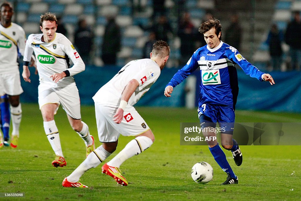 Bastia's Fethi Harek (R) vies with Socha