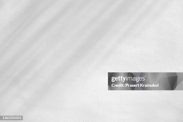 shadow on a white concrete walls. - blackboard texture stock pictures, royalty-free photos & images