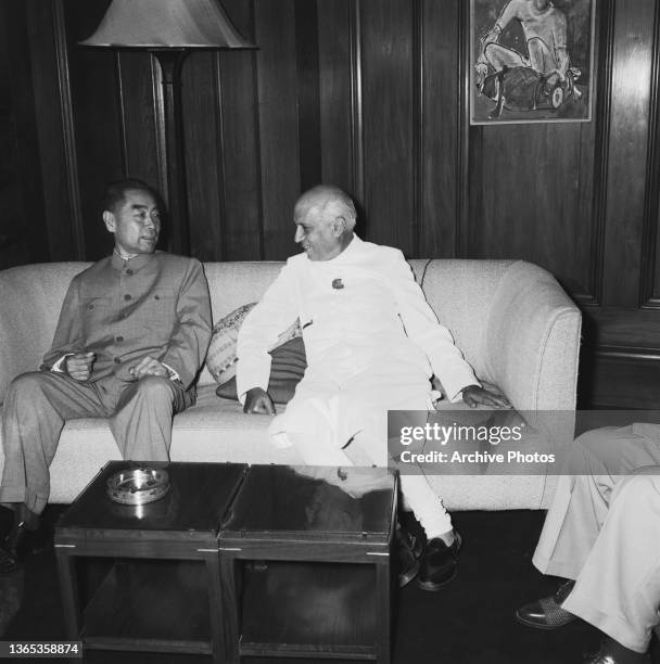 Zhou Enlai , Premiere of the People's Republic of China, with Indian Prime Minister Jawaharlal Nehru during a visit to India, 21st April 1960.