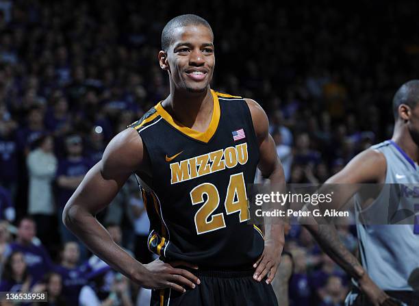 Guard Kim English of the Missouri Tigers reacts after a foul call against the Tigers during the second half against the Kansas State Wildcats on...