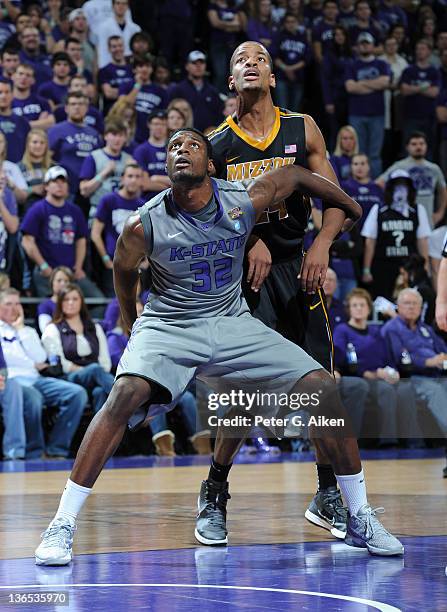 Forward Jamar Samuels of the Kansas State Wildcats gets set for a rebound against guard Kim English of the Missouri Tigers during the second half on...