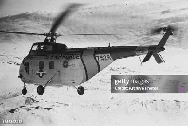 Sikorsky H-19 Chickasaw, an SH-19B air rescue helicopter of the US Air Force at Thule Air Base in Greenland, USA, 1955. It is the northernmost base...