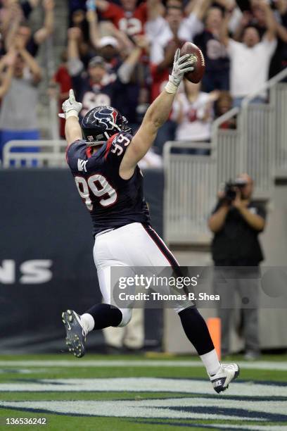 Watt of the Houston Texans celebrates as he returns an interception 29-yards for a touchdown in the second quarter against the Cincinnati Bengals...