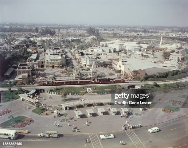 An aerial view of Disneyland in Anaheim, California, USA, showing the elevated railroad and entrance, circa 1955.