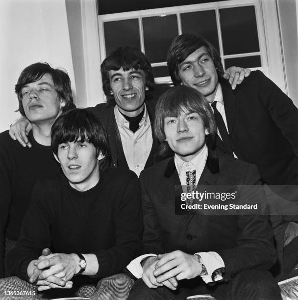 English rock band The Rolling Stones, UK, 4th May 1964. From left to right, they are singer Mick Jagger, guitarist Keith Richards, bassist Bill...