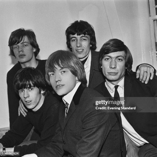 English rock band The Rolling Stones, UK, 4th May 1964. From left to right, they are singer Mick Jagger, guitarist Keith Richards,...