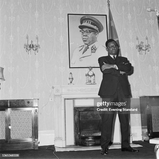 Congolese politician Major-General Mobutu Sese Seko stands in front of a portrait of Joseph Kasa-Vubu, President of the Democratic Republic of the...