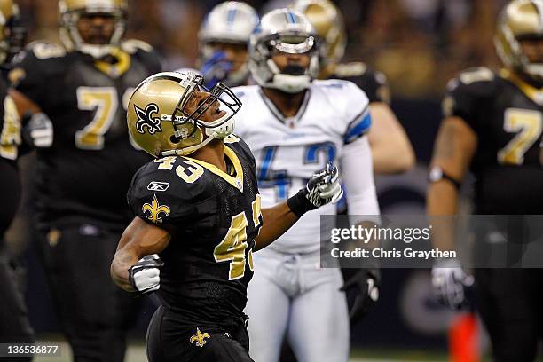 Darren Sproles of the New Orleans Saints reacts after a run against the Detroit Lions during their 2012 NFC Wild Card Playoff game at Mercedes-Benz...