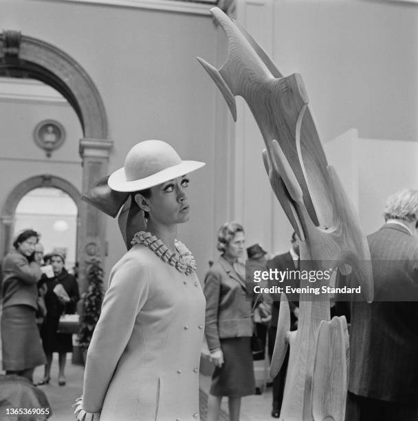 English actress Amanda Barrie at the 1964 Royal Academy Summer Exhibition in Burlington House, Piccadilly, London, UK, 5th May 1964.