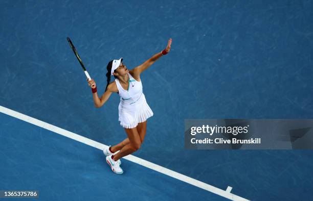 Emma Raducanu of Great Britain serves in her first round singles match against Sloane Stephens of United States during day 2 of the 2022 Australian...