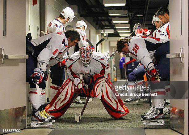 Alex Ovechkin, Tomas Vokoun and Alexander Semin of the Washington Capitals prepare for warmups prior to their game against the San Jose Sharks at the...