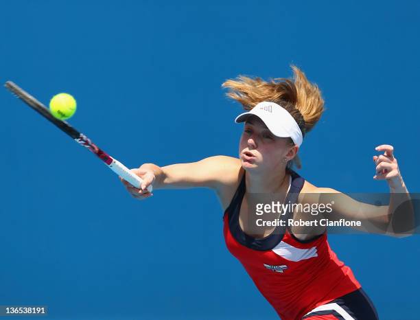 Anna Chakvetadze of Russia plays a forehand in her singles match against Monica Niculescu of Romania during day one of the 2012 Hobart International...