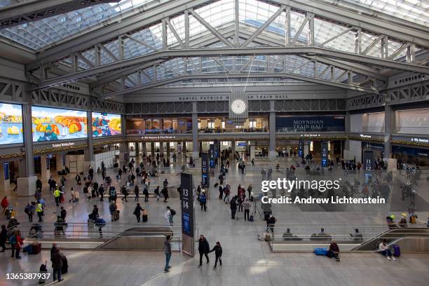 The day before Thanksgiving, holiday travelers arrive at the newly built Moynihan train hall in Penn Station to catch Amtrak trains out of the city,...