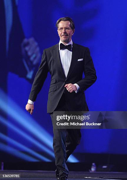 Actor Gary Oldman accepts the International Star Award onstage during The 23rd Annual Palm Springs International Film Festival Awards Gala at the...