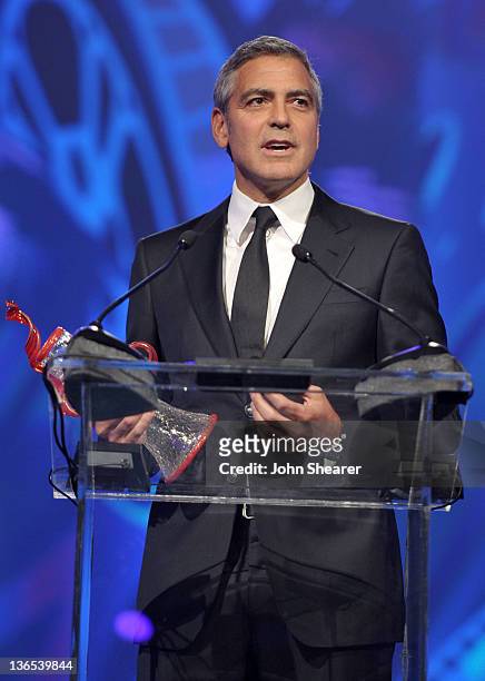 Actor George Clooney accepts the Chairman's Award onstage during The 23rd Annual Palm Springs International Film Festival Awards Gala at the Palm...