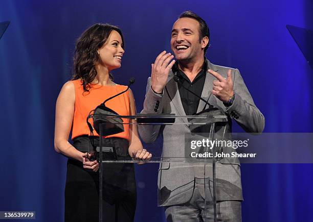 Actors Berenice Bejo and Jean Dujardin speaks onstage during The 23rd Annual Palm Springs International Film Festival Awards Gala at the Palm Springs...