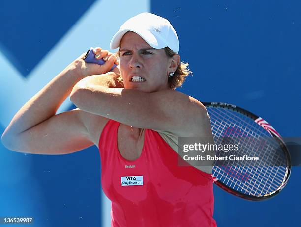 Greta Arn of Hungary plays a forehand in her singles match against Anastasia Rodionova of Australia during day one of the 2012 Hobart International...